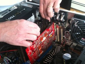 Installing computer components in new machine - Contact us if you need help installing a new motherboard or new SSD.